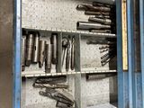 a metal tool box with many tools in it