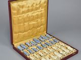 a box that has a lot of small bottles inside of it