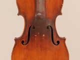 an old violin with a wooden back and bow on a white background