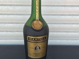 a bottle of liquor that is sitting on a table