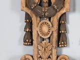 a wooden shelf with a clock on top of it