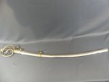 an image of a sword that is on a table