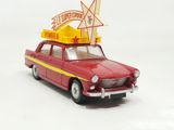 a red toy car with a star on top of it