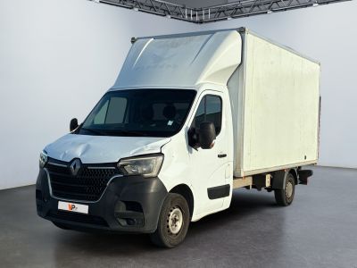 a white van that is parked in a large room