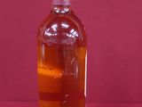 a bottle of alcohol that is sitting on a table