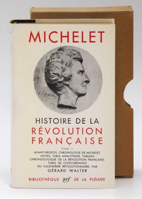 an old book with a picture of a woman ' s face on it
