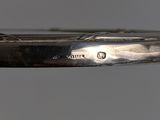 a knife that is laying on top of a table