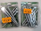 two packages of screws in the package on the table