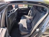 the back seats of a car are empty in the parking lot