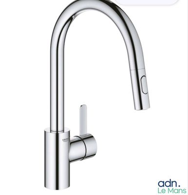 a close up of a kitchen faucet with a white background