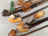 many different types of pipe smokings on a table