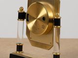 a clock that is sitting on top of a table