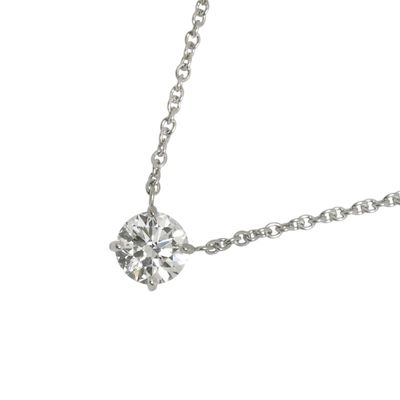a diamond pendant on a chain on a white background