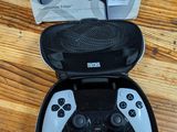 a box with two controllers in it sitting on a table
