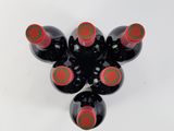 six bottles of wine are arranged in a star shape