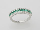 an emerald and diamond ring