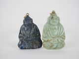 two jade buddha pendants, one green and one blue, on a white background