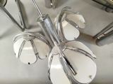 a bunch of utensils and spoons on the counter