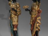 pair of antique bronze figures of a man and a woman