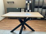 a table that has a book on it in a room
