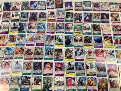 a large collection of pokemon cards on a table