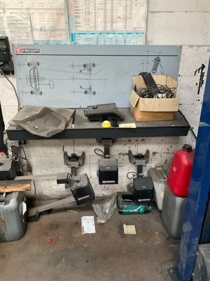 a picture of a room with a bunch of tools on the counter