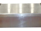 stainless steel storage box with orange handles on a white background