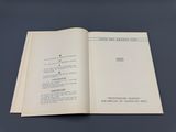 a close up of a book open on a table