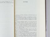 a open book with a picture of a cat on it
