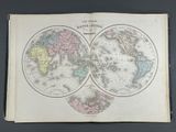 an old map of the world in two circles with the names of the countries