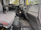 a seat in the back of a truck with a seat cover