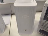 a white desktop computer sitting on top of a white desk