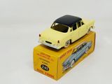 a yellow toy car sitting on top of a yellow box