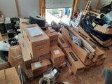 a lot of boxes that are stacked up in a garage