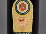 a bottle of wine that is sitting on a table