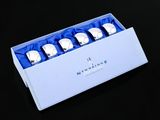a box that has four silver watches in it