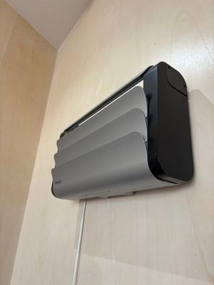 an image of a wall mounted air conditioner in a bathroom