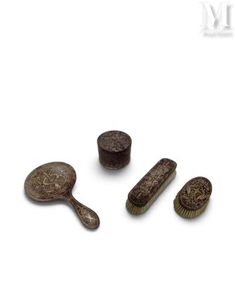 three wooden brushes and a brush on a white surface