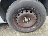 a close up of a flat tire on a car