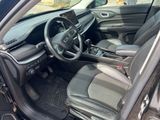 the interior of a car with a steering wheel and a dash board