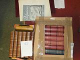 a box of books and a box of books on a table