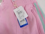 a label on a pink pants with a barcode on it