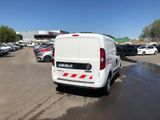 a white van that is parked in a parking lot
