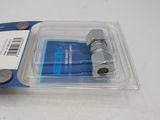 a plastic package with a blue card in it on a table