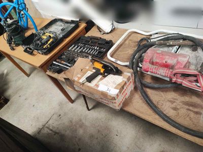 a table that has a bunch of tools on it