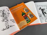 an open book with a drawing of a man and a woman on it