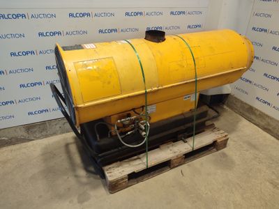 a yellow tank sitting on a pallet in front of a wall