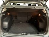 a trunk of a car with the back seats folded down
