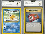 two pokemon cards with different designs on them in a plastic case