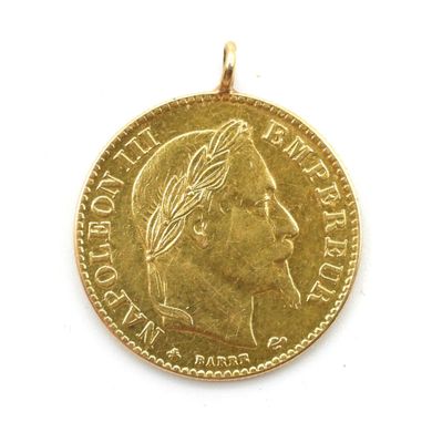 l'image d'une pièce d'or sur laquelle figure le visage d'une femme